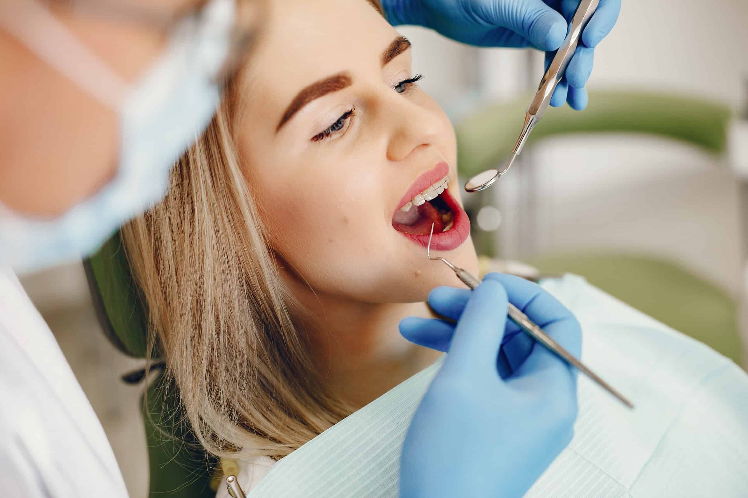 Patient being checked by dentist